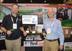 Adrian Down and Todd Bagget with RedLine Solutions proudly show different scanners that help with inventory management.